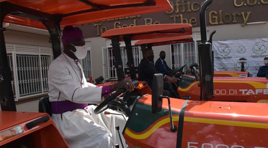Government through NAADS hands over 5 additional Tractors to Church of Uganda
