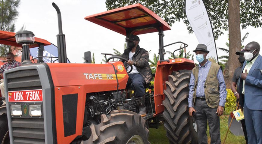 NAADS donates 2 Farm tractors to King Oyo’s Model Farm